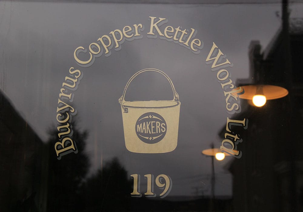 Bucyrus Copper Kettle logo on front door window